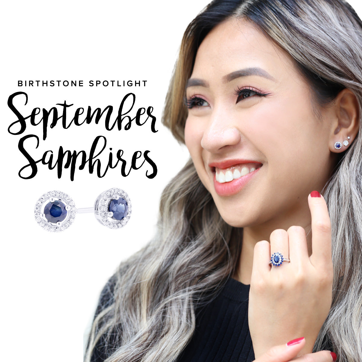 A woman smiling and showing some of our sapphire collection including a necklace, bracelet, and earrings.